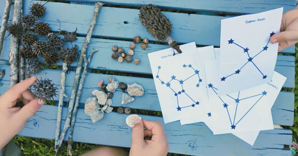 Child collects nature items to recreate constellations. Preschool space books, space activities for preschoolers, outer space activities for preschoolers